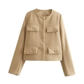 Close-up detail of beige tweed jacket featuring textured fabric and gold buttons - Khaki