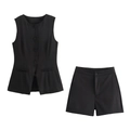 Detailed flat lay of black two-piece vest and shorts set with button-down vest and high waist - S / Top And Bottom / Black