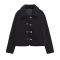 Close-up detail of black teddy fleece texture and decorative metal buckle closures - XS / Black