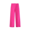 Detail view of fuchsia high waist wide leg trousers with pleated crease design - XS / Bottoms / Rose Pink