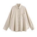 Dettaglio della trama di lino e dei bottoni su una camicia beige dal taglio ampio - XS / Albicocca