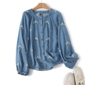 Camicetta azzurra con ricamo floreale, scollo rotondo e maniche a lanterna stile casual - M / Azzurro