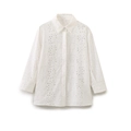 Detailed view of intricate floral eyelet embroidery on white long sleeve shirt fabric - S / White