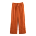 Détail du pantalon large en lin rouge brique à taille haute avec cordon de serrage - S / Bottoms / Rouge Orangé