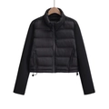 Close-up of black cropped jacket featuring stand collar and adjustable drawstring hem - XS / Black