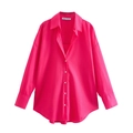 Front view of vibrant rose red oversized poplin shirt with white buttons and curved hem - XS / Rose Red