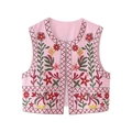 Close-up of pink embroidered vest featuring bohemian floral patterns and cotton texture - XS / Pink