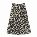 Jupe mi-longue noire à taille haute avec imprimé pâquerettes blanc et jaune, coupe en A - XS