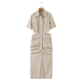 Detail view of beige shirt dress with side cut-outs and ruched skirt design - Khaki