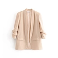Close-up of shawl collar and pleated sleeve cuffs on apricot casual blazer - S / Apricot