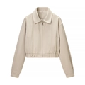 Detail van een lichtbeige kort jack met omslagkraag en gladde metalen ritssluiting - S / Tops