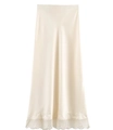 Detail shot of champagne satin midi skirt with elegant lace trim at the bottom hem - Milky White