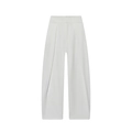 Détail du pantalon blanc taille haute avec plis sur le devant et tissu fluide drapé - Blanc