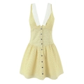 Détail d'une robe jaune clair à pois avec décolleté en V profond et bordure en dentelle - S / Jaune