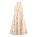 Elegantes cremefarbenes Neckholder-Maxikleid mit gestuftem Rüschenrock und V-Ausschnitt - XS / Creme