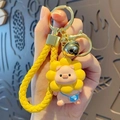 Sunflower pig keychain with yellow woven strap and golden bell charm for bags - Lanyard Style / Yellow