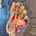Pink cartoon pig keychain with sunflower headpiece and woven leather hand strap - Lanyard Style / Pink