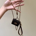 Miniature leopard print leather bag pendant necklace with gold hardware and woven lanyard - Dark Coffee