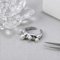 Artistic stainless steel open ring with irregular texture and four white pearls inlay - One Size / Steel