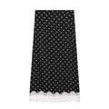 Close-up of black skirt fabric with white polka dots and delicate eyelash lace trim - XS / Black White Polka Dot