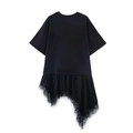 Detailed view of asymmetric lace patchwork hem on a black short sleeve t-shirt top - XS / Black