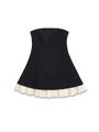 Detail view of the black strapless top with white pleated hem and A-line silhouette - S / Black Patchwork Cream
