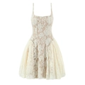 Close-up detail of cream lace mini dress with delicate floral mesh and spaghetti straps - Beige