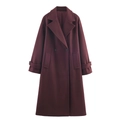 Detailed view of the burgundy wool coat featuring classic double-breasted buttons and lapels - Burgundy