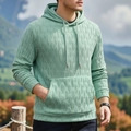 Détail du sweat à capuche vert clair avec texture ondulée verticale et poignets côtelés - L / Vert émeraude