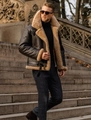 Detail of premium brown shearling aviator jacket with thick faux fur collar and leather buckles - S / Tops / Black