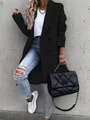 Street style shot of black double-breasted coat with blue ripped jeans and chain handbag - M / Black