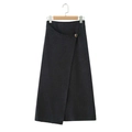 Chic dark grey knitted wrap skirt with asymmetrical hem and brown decorative button - S / Black and Gray