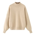 Detail view of beige loose-fit knit sweater with ribbed mock neck and dropped shoulders - S / Apricot