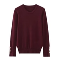 Detail of burgundy knit sweater showing golden decorative buttons on long sleeves cuff - S / Burgundy