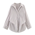 Close-up of white striped long-sleeve shirt showing chest pocket and button-down details - Brown White Stripe