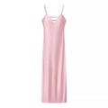 Detail view of pink satin midi dress showing V-neck design and thin decorative straps - XS / Pink