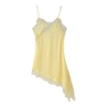 Detail of light yellow silk camisole with delicate lace trim on asymmetric hemline - Yellow