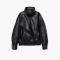 Detailed view of the black faux leather jacket featuring a textured lychee grain finish - XS / Black
