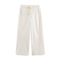 Dettaglio dei pantaloni larghi crema con vita elastica e coulisse regolabile - Taglia S / Pantaloni Bianco Crema