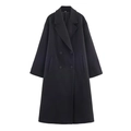 Detail view of black wool blend coat with double-breasted buttons and classic notched lapels - Black