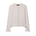 Chic beige knit cardigan featuring delicate ruffle trim and button front closure - XS / Apricot