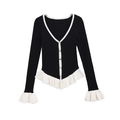 Dames vest in zwart breisel met witte ruches randen en contrasterende details - S / Zwart