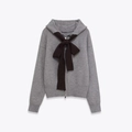 Grey knitted zip-up hoodie for women featuring a large decorative black bow detail - S / Gray