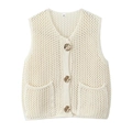 Detail of knit vest with gold buttons, textured mesh pattern and size M label - S / White