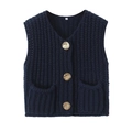 Detail of navy knit vest showing golden embossed buttons and symmetrical front pockets - Navy Blue