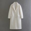 Elegant women's long white faux fur coat with classic lapels and single-breasted buttons - S / White