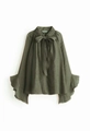 Detail of dark green chiffon blouse featuring elegant bow tie neck and ruffle flare sleeves - Army Green