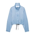 Detailed view of women's light blue polka dot bomber jacket with adjustable drawstring hem - Blue Polka Dot Jacket