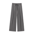 Detail of dark grey linen blend wide leg pants featuring elastic drawstring waist and pleats - XS / Gray Pants
