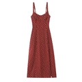 Detailed view of the side slit and classic polka dot pattern on the red midi dress - Red Polka Dot